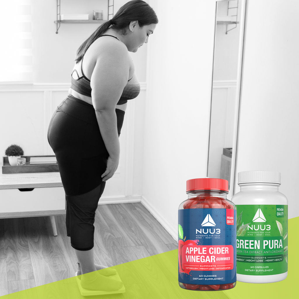 Person standing in front of a mirror with two supplement bottles labeled 'NUU3 Apple Cider Vinegar'