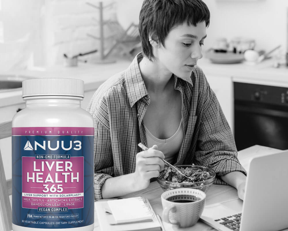 Woman eating at a kitchen table with a Nuu3 supplement bottle in the foreground